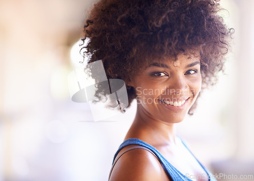 Image of Woman, portrait and happiness in fashion with bokeh, natural beauty or casual outfit in summer. African person, face or smile with afro hairstyle, wellness or trendy style with mockup space in Africa