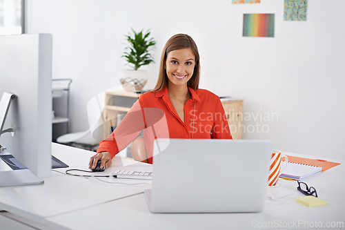 Image of Professional, portrait and happy woman at computer or desktop in office with creative web developer. Website, designer or person with research on internet for development of company software and erp