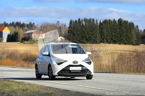 Image of White Toyota Aygo City Car on Road