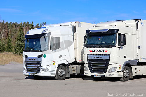 Image of White DAF XF Heavy Trucks of Two Generations