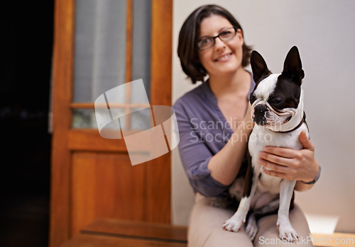 Image of Portrait, mature woman and smile with dog, happiness and relax with pet in home and outdoor. Summer, house and female person together with animal for love, care and support with loyalty on bench