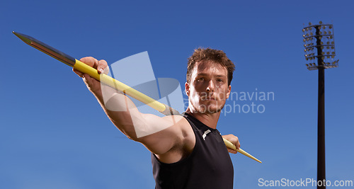 Image of Portrait, javelin and man with fitness, sports and blue sky with workout and wellness with practice. Face, person and athlete with tournament and competition with exercise and competitor with spear