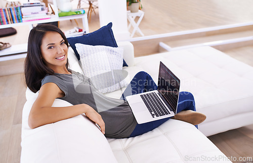 Image of Laptop screen, smile and portrait of woman on a sofa with social media, blog or web communication at home. Pc, mockup or face of female person in a living room with google it, sign up or subscribe