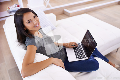 Image of Happy, portrait and woman with laptop screen on a sofa for social media, blog or web communication at home. Pc, mockup or face of female person in a living room with google it, sign up or subscribe