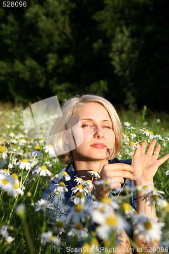 Image of Young Woman With daisy