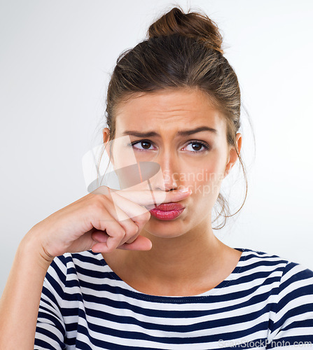 Image of Thinking, funny and finger moustache with woman, happy and person on a white studio background. Model, mockup space and girl with hand gesture and silly with expression and joke with comedy and goofy