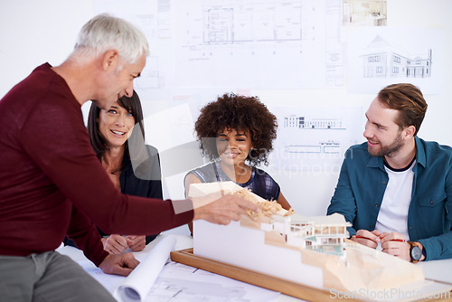 Image of Employees, model and presentation for industrial architecture, project layout and meeting for construction. Property developers or engineers with 3d graphic or design and remodeling from blueprint.