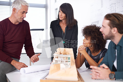 Image of Manager, meeting and model for industrial architecture, presentation and project layout for construction. Property developers or engineers with 3d graphic or design and remodeling from blueprint.