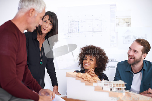 Image of Employees, meeting and model for industrial architecture, presentation and project layout for construction. Property developers or engineers with 3d graphic or design and remodeling from blueprint.