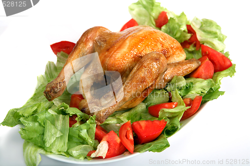 Image of Roast chicken on a bed of salad