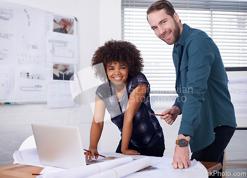 Image of Architecture, laptop and smile with business people meeting in boardroom of office for construction. Building, computer or creative with happy man and woman architect team in workplace for planning