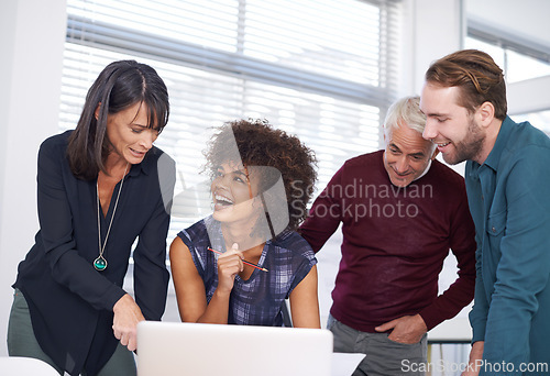 Image of Web designers, laptop and brainstorming with office, diversity and meeting or creative partnership. Employees, discussion and collaboration for blueprint, plans and problem solving for startup agency