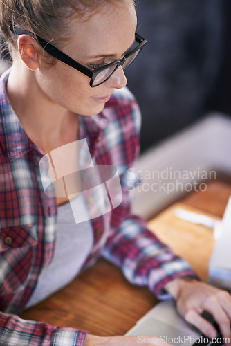 Image of Woman, laptop or writing as freelance, research or social media blog in business for remote work. Professional, female writer or typing on computer in digital, creative or communication on web email