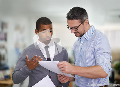 Image of Team, planning and business men with documents for brainstorming in office. Strategy, diversity and professional people with paperwork for discussion, cooperation and financial advisor in meeting