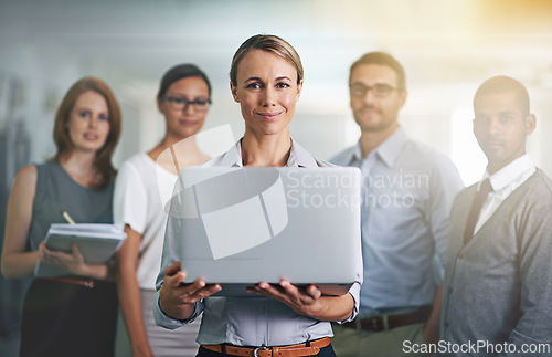 Image of Laptop, happy woman and team leader with business people in portrait at office for staff in cooperation together. Face, computer and professional group of employees, consultants and collaboration