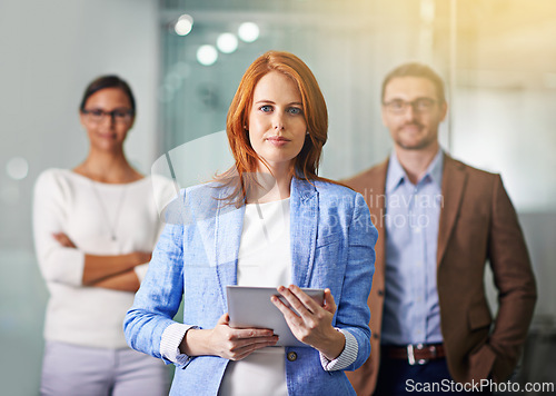 Image of Tablet, woman and portrait of team leader with business people at office for coworking or cooperation together. Face, technology and professional group of employees or consultants in collaboration