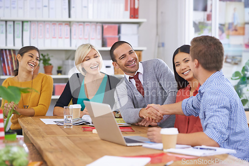 Image of Business people, b2b and handshake for onboarding in office, recruitment and introduction in meeting. Happy, colleagues and agreement in partnership, smile and congratulations for hiring or deal