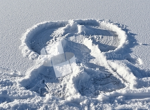 Image of snow angel on the snowy surface