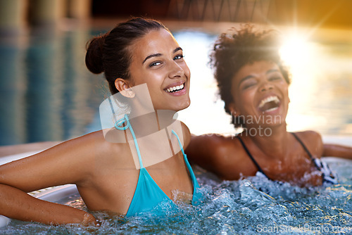 Image of Women, friends and happiness in portrait in jacuzzi at spa, self care and pamper day for wellness and healing. Water, bubbles and hot tub for detox and stress relief, friendship date and bonding