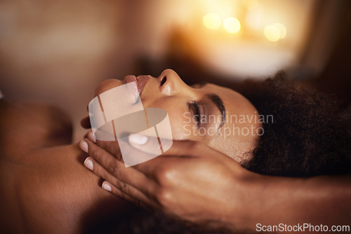 Image of Woman, relax and wellness in spa for massage, care and cosmetic treatment for break or peace. African person and natural for holistic therapy with hand on face for skincare, clean and hygiene