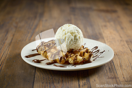 Image of plate of belgian waffle with ice cream