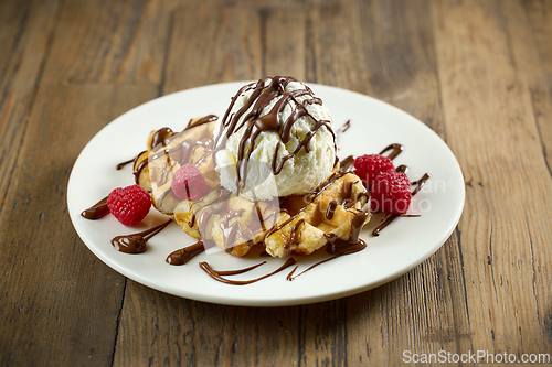 Image of plate of belgian waffle with ice cream