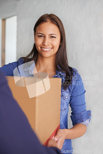 Image of Woman, package and portrait with delivery, order and moving box for real estate and property. Cardboard, shipping and giving with smile and happy homeowner with courier service and customer at home