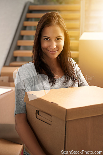 Image of Woman, packing and boxes with portrait from delivery, carry or moving for new real estate and property. Cardboard, shipping and smile and happy homeowner with package and parcel by house stairs