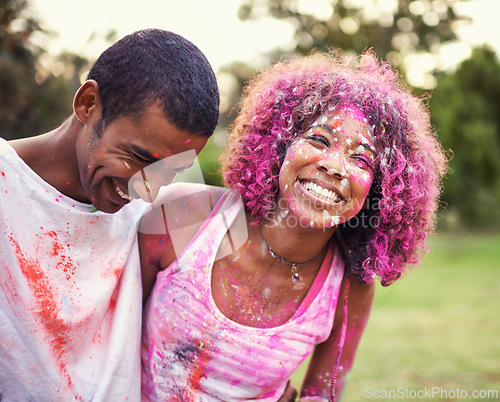 Image of Happy, powder paint and couple of friends outdoor with Holi festival and colorful event with smile. Celebration, love and excited in nature with African people and crazy color dust for party together