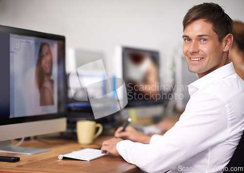 Image of Businessman, portrait and designer with computer for digital marketing, web design or photography at office. Man or creative employee with smile and typing on desktop PC for advertising in startup