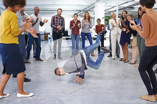 Image of Breakdance, office and business people in celebration for success, teamwork and achievement at startup. Dance, team building and excited staff with applause, smile and happiness in circle with fun