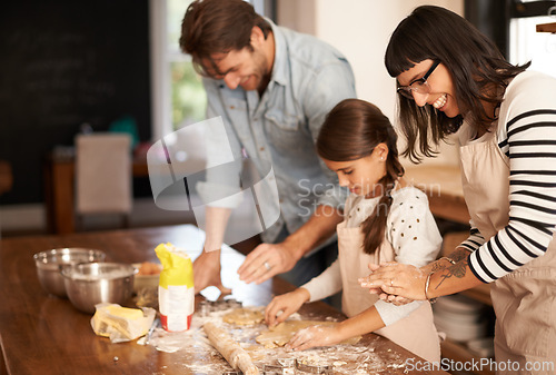 Image of Mother, father and girl with baking cake in kitchen with oven, happiness and teaching with support. Family, parents and child with helping, learning and bonding with cooking for dinner and cookies