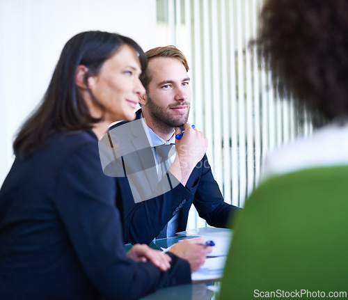 Image of Business, partnership and employees in meeting, presentation or listening in office, workspace or conference room. Workers, people and team at workshop in corporate career, finance or banking