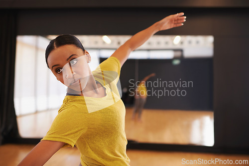 Image of Ballet, dance and woman in fitness studio for performance, show or theater rehearsal. Art, balance or female dancer with classic, beauty or movement for ballroom, steps or warm up for stage training