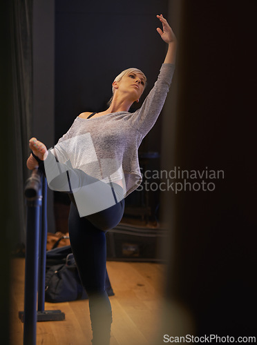 Image of Ballet, posture and woman with leg stretch in dance studio for performance, show or theater rehearsal. Art, balance or lady dancer with stretching pole for ballroom, fitness or warm up stage training