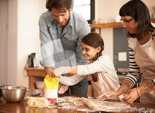 Image of Mother, father and girl with flour for cooking in kitchen with dough, happiness and teaching with support. Family, parents and child with helping, learning and bonding with baking for cake or cookies