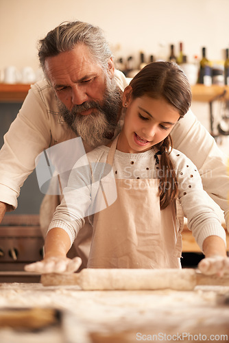 Image of Girl, child and grandfather for cooking with dough for baking and teaching with support, helping or rolling pin. Family, senior man or grandchild with cake preparation in home for bonding or learning