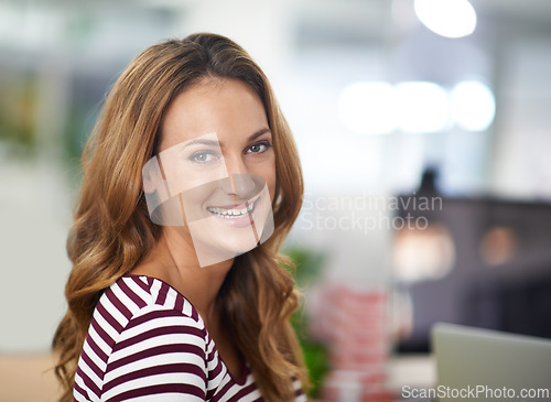 Image of Woman, portrait and smile with workplace, startup and creative work or job. Designer, employee and office for career, internship or entrepreneurship with positive and happiness on blurred background