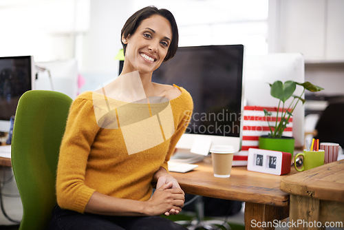 Image of Portrait, smile and business woman in startup, office or company for creative job on chair in workplace. Face, happy professional and entrepreneur, employee and editor working on career in Brazil