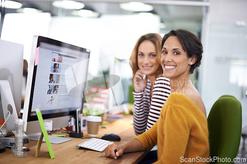 Image of Computer, portrait and smile of business women in office at table in startup company for creative career. Face, coworking and happy team together, entrepreneur or professional web designer at desk