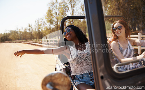 Image of Women, travel or happy on road trip in countryside, tourist or holiday adventure for leisure in nature. Ladies, driving and smile in convertible suv in summer and bonding together for tour in texas