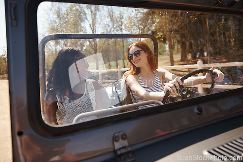 Image of Women, happy or talking on road trip in nature, care or travel adventure for holiday in countryside. Friends, driving or cool in convertible van on summer vacation, love or bonding together in texas