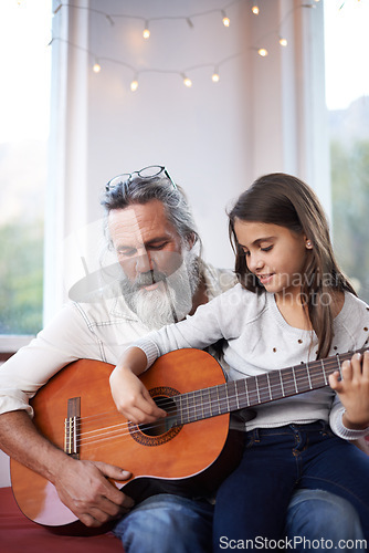 Image of Old man, girl or guitar as teaching, music or training as creative practice for skill development. Grandpa, kid or instrument as learning to mentor, guide or advice as song, bonding or together