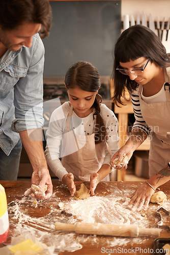 Image of Mother, father and girl with flour for baking cookies in kitchen with dough, rolling pin and teaching with support. Family, parents and child with helping, learning and bonding with cooking for hobby