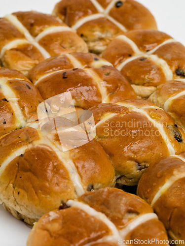 Image of Hot cross, buns and easter for traditional holiday food for vacation brunch as celebration baked goods, treat or religion. Snack, meal and festive season fiber or nutrition dessert, recipe or event