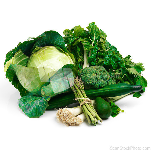 Image of Organic, ingredients and green vegetables in studio for vegetarian food, healthy diet and nutrition. Fresh produce, groceries and harvest on white background for dinner, vegan lifestyle and wellness