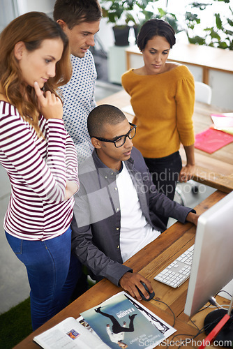 Image of Startup, casual and laptop with employees at desk, teamwork and digital branding or design on tech or computer. Happy, people and creative for designer company or agency, collaboration and top view.