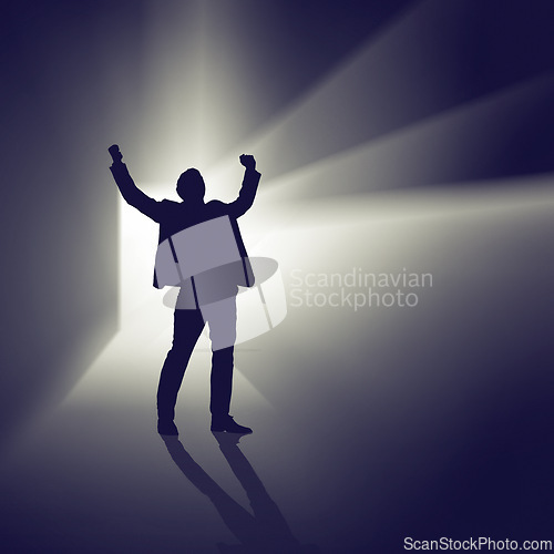 Image of Abstract, silhouette and businessman in studio for celebration for good news or promotion. Illustration, light and shadow of professional person cheering for winning or success by black background.