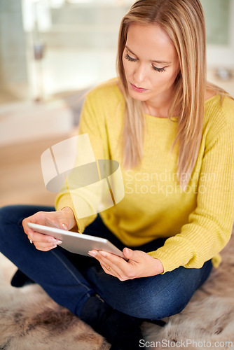 Image of Tablet, search and woman relax on a floor with social media, streaming or subscription in her home. Digital, ebook and female person in a living room with google it, sign up or Netflix and chill app