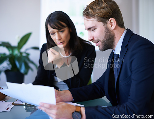 Image of Business people, teamwork and boardroom meeting or paperwork or financial growth, partnership or coworkers. Man, woman and document in conference room or review, project planning or problem solving